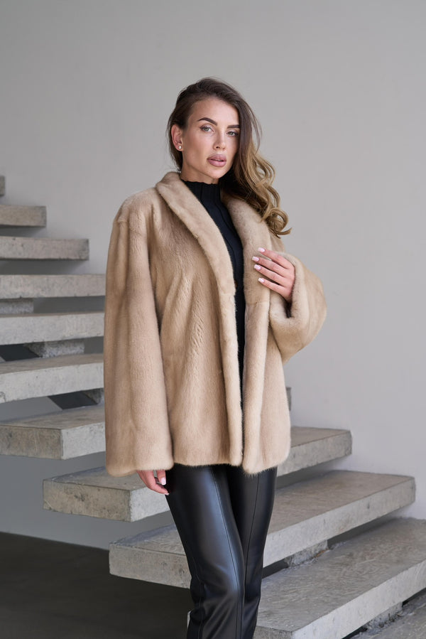 Short mink coat in pastel color