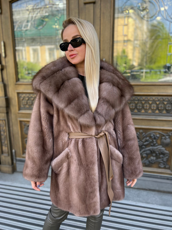 Fur coat in natural color with hood