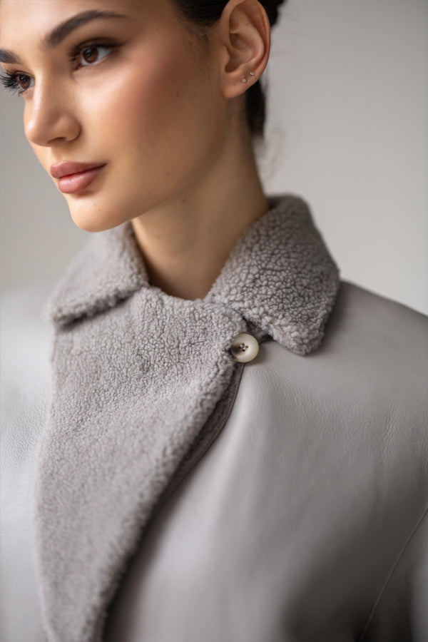 Premium two-sided gray sheepskin coat for women - soft material, chic warm design.  
